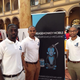 GreaseMonkey Mobile Chief Technology Officer Bradly Joseph, Chief Executive Officer Stephan Walters and Chief Business Officer Robert Davis pose in front of their exhibit during a DC TechDay in Washington, D.C., Nov, 2014.
Courtesy of GreaseMonkey Mobile LLC